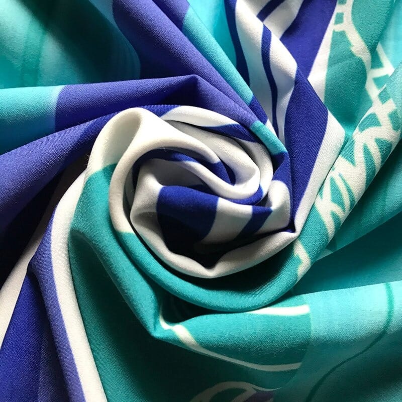 Tissu de la robe de plage fendue style ethnique de couleur bleu